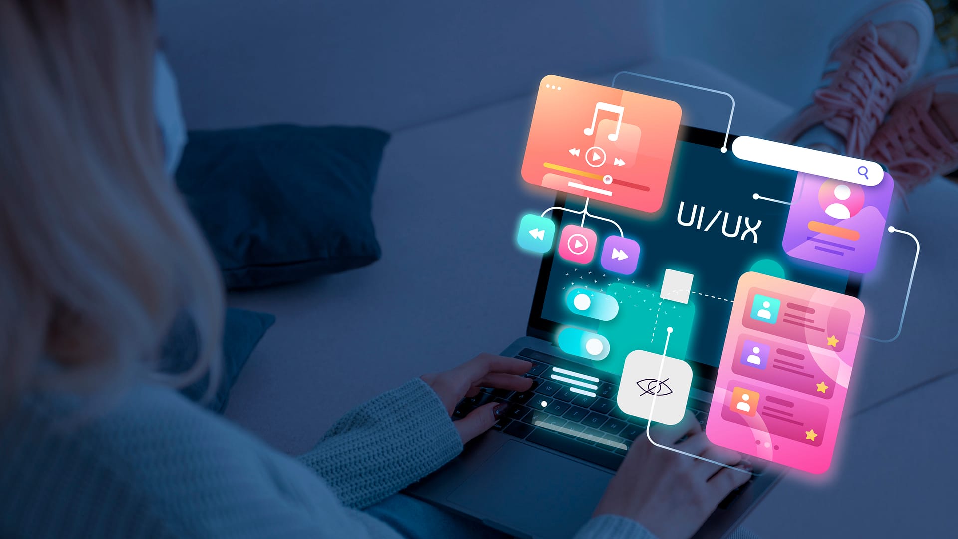Kobieta korzystająca z laptopa, wokół której pojawiają się hologramy ikon narzędzi AI – AI content creation tools 2025